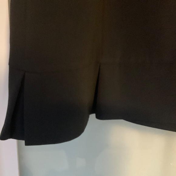 Zara. Pretty black sleeveless waistcoat with fluted hem - Picture 2 of 8